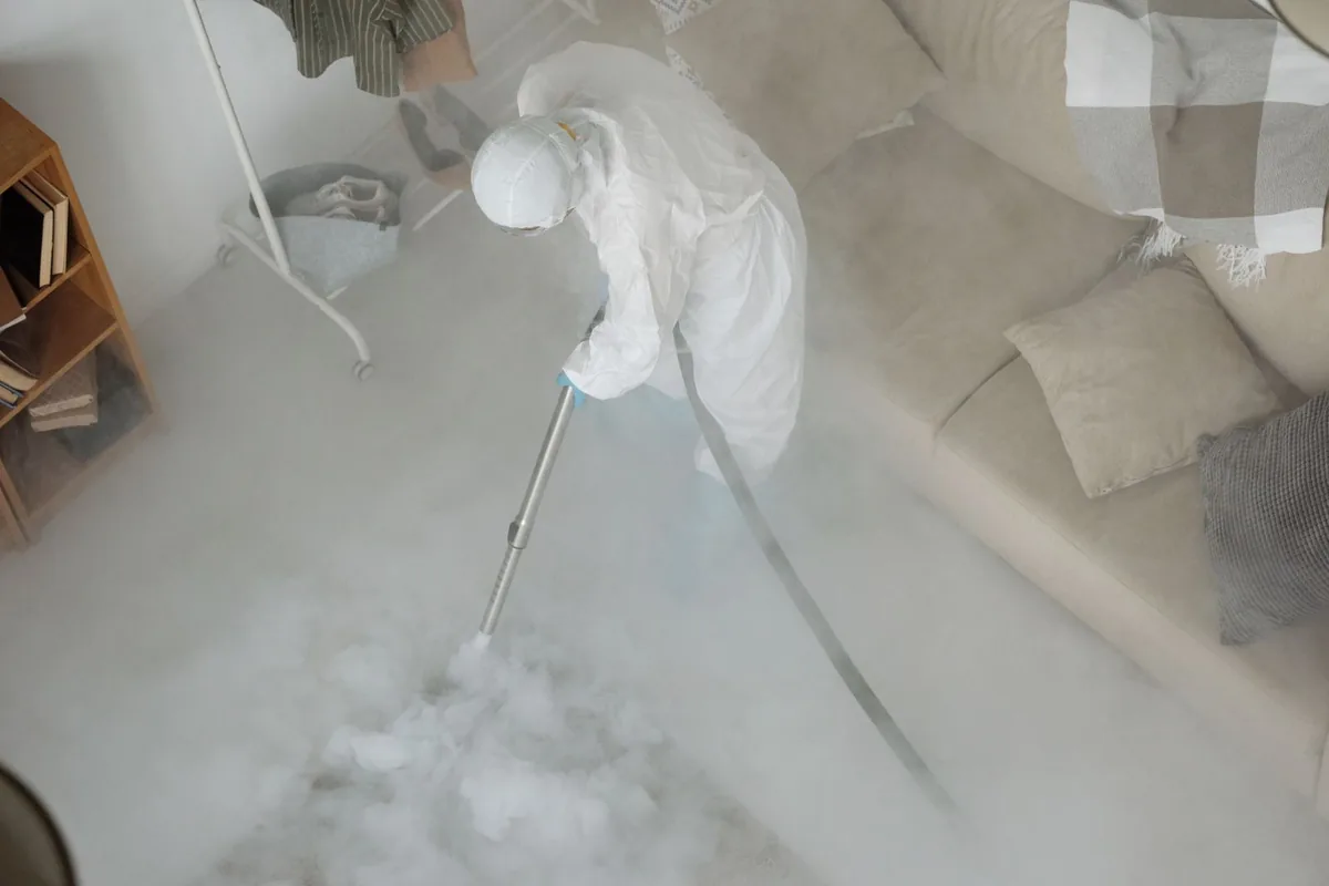 Biohazard cleanup technician in protective equipment, Lake Wildwood, CA